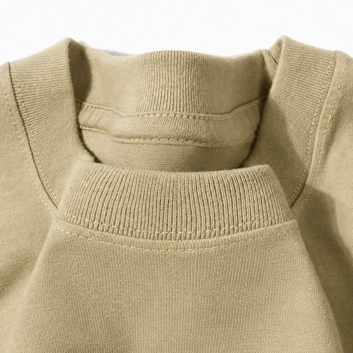 Close-up of the crew neckline on the Men's Plain Heavyweight Tee in Khaki