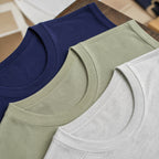 Stacked heavyweight tanks with navy on top, fabric close-up